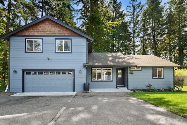 8824 224th St SW, Edmonds, WA 98026 - traditional home featuring a garage, driveway, a shingled roof, and a front yard