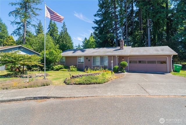 2623 25th Ct SW, Olympia, WA 98512 - ranch-style home with a chimney, a garage, driveway, and a front lawn
