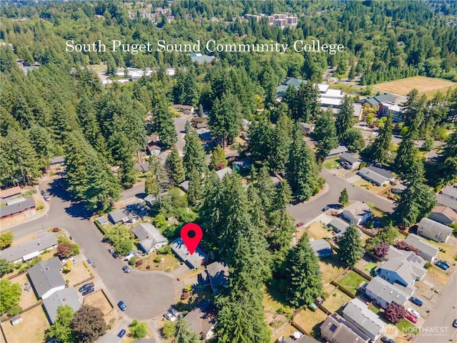 2623 25th Ct SW, Olympia, WA 98512 - aerial view of property's location with a heavily wooded area