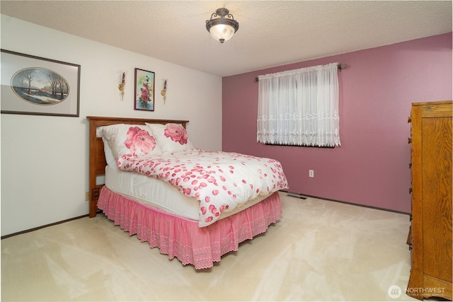 2623 25th Ct SW, Olympia, WA 98512 - bedroom featuring carpet floors, baseboards, and a textured ceiling