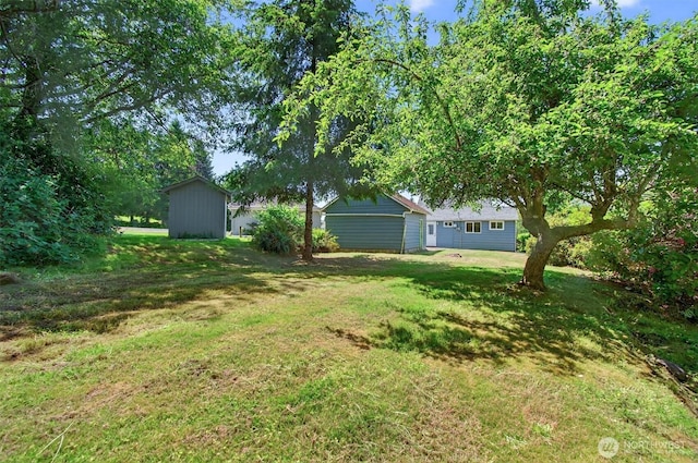 325 E State Route 4, Cathlamet, WA 98612 - view of green lawn featuring an outbuilding