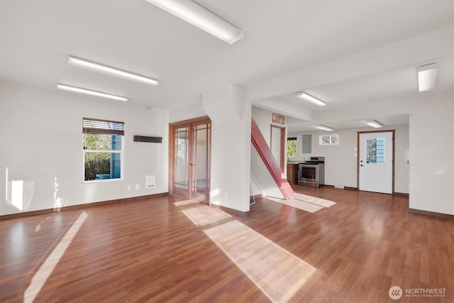 325 E State Route 4, Cathlamet, WA 98612 - unfurnished living room with wood finished floors and baseboards
