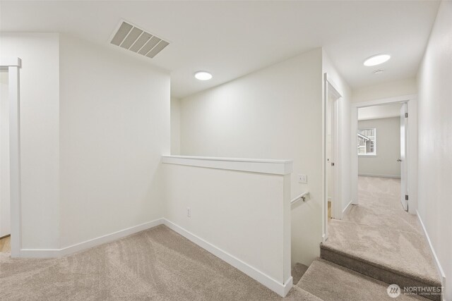 717 115th St E, Tacoma, WA 98445 - hall featuring carpet flooring and an upstairs landing