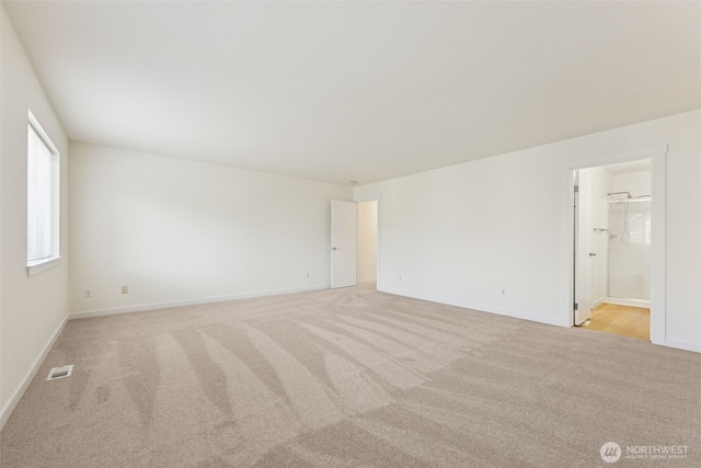 717 115th St E, Tacoma, WA 98445 - spare room with light colored carpet