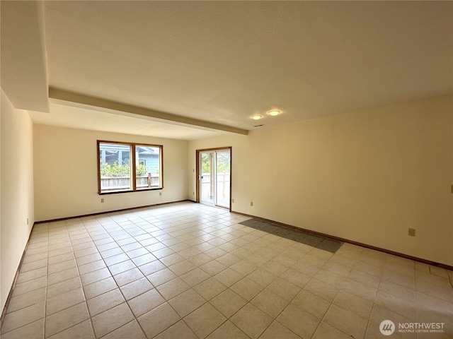 832 Whale Ct SW, Ocean Shores, WA 98569 - unfurnished room featuring baseboards and light tile patterned floors