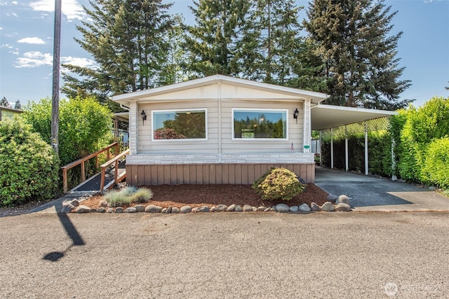 400 Gupster Unit 2, Sequim, WA 98382 - manufactured / mobile home featuring driveway and a carport