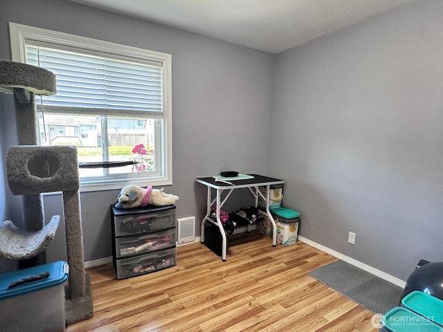 2036 30th Ave, Longview, WA 98632 - misc room with wood finished floors and baseboards