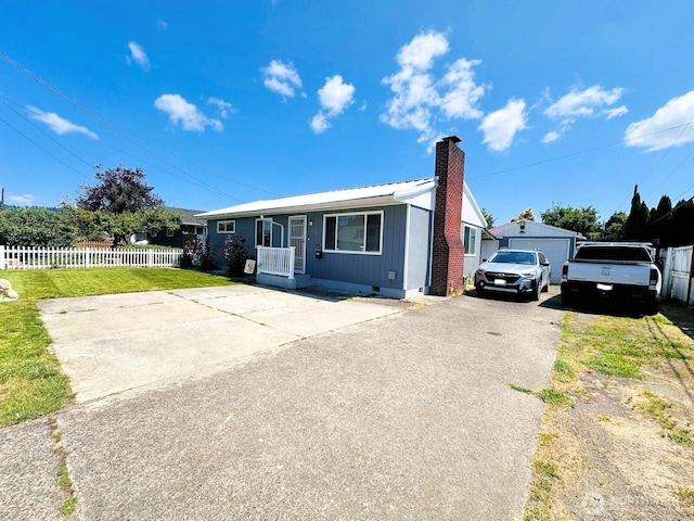 2036 30th Ave, Longview, WA 98632 - single story home with a chimney and metal roof