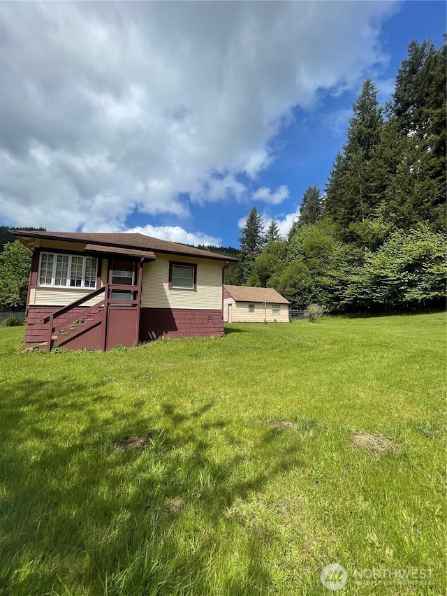 1204 Howard St, Raymond, WA 98577 - back of house with a lawn