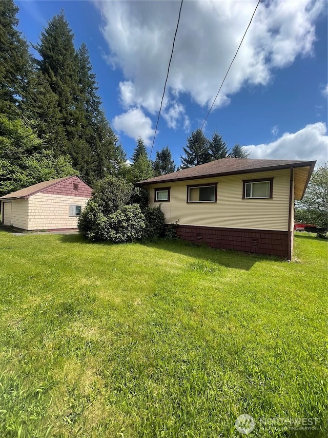 1204 Howard St, Raymond, WA 98577 - view of property exterior featuring a yard
