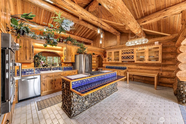 1416 Marietta Ave, Bellingham, WA 98226 - kitchen with stainless steel appliances, log walls, a sink, wood ceiling, and brown cabinets
