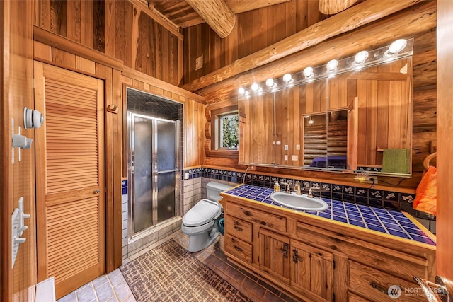 1416 Marietta Ave, Bellingham, WA 98226 - full bath with toilet, a shower stall, vanity, wooden ceiling with exposed beams, and wooden walls
