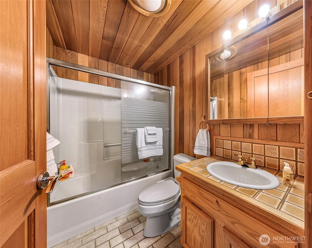 1416 Marietta Ave, Bellingham, WA 98226 - full bath with toilet, bath / shower combo with glass door, vanity, wooden walls, and wooden ceiling