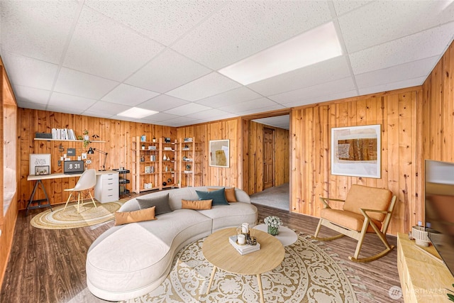 1416 Marietta Ave, Bellingham, WA 98226 - living area with wood walls, wood finished floors, and a drop ceiling