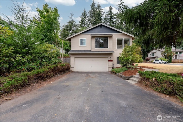 7309 46th Street Ct W, University Place, WA 98466 - view of front of property featuring an attached garage and asphalt driveway
