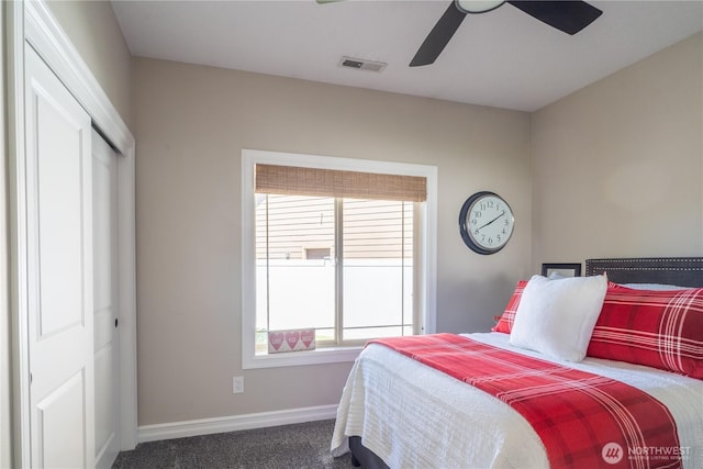 550 N Sparrow Ln, Moses Lake, WA 98837 - carpeted bedroom with baseboards, a closet, and a ceiling fan