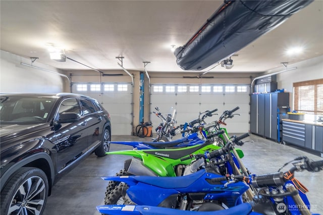550 N Sparrow Ln, Moses Lake, WA 98837 - garage featuring a garage door opener