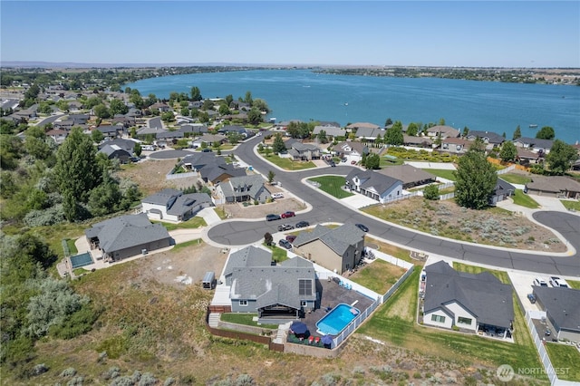 550 N Sparrow Ln, Moses Lake, WA 98837 - aerial perspective of suburban area with a large body of water and a pool