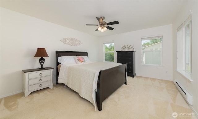 10312 26th Pl SE, Lake Stevens, WA 98258 - bedroom featuring a baseboard heating unit, light colored carpet, and ceiling fan