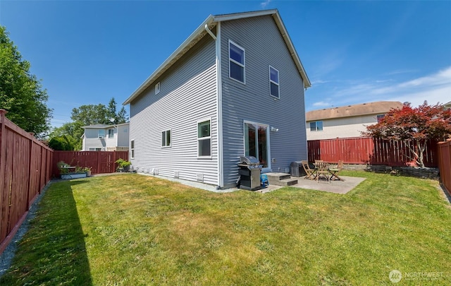 10312 26th Pl SE, Lake Stevens, WA 98258 - rear view of property with a patio area and a fenced backyard