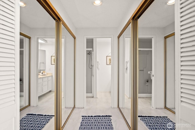 16929 Inglewood Rd NE Unit C201, Kenmore, WA 98028 - hall with recessed lighting and baseboards