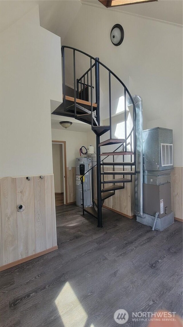 1618 112th St S, Parkland, WA 98444 - stairs featuring wood finished floors, water heater, and a high ceiling