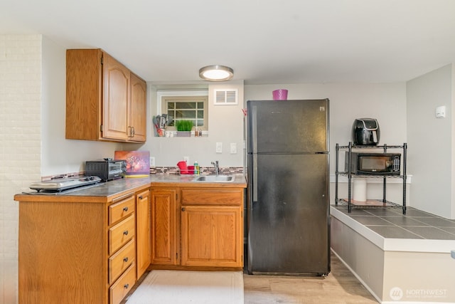 1833 3rd Ave, Kirkland, WA 98033 - kitchen featuring black appliances and light wood finished floors