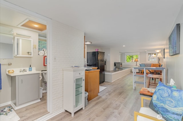 1833 3rd Ave, Kirkland, WA 98033 - living room featuring light wood-style floors and baseboards