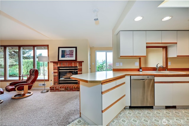 20135 Bue Rund Loop NE, Poulsbo, WA 98370 - kitchen featuring dishwasher, a sink, light countertops, white cabinets, and recessed lighting