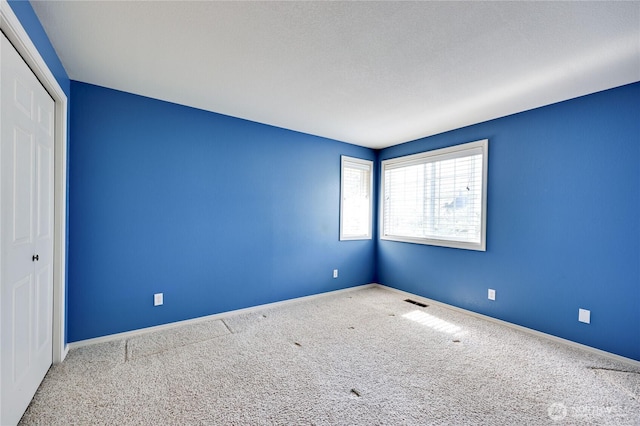 20135 Bue Rund Loop NE, Poulsbo, WA 98370 - unfurnished room with carpet floors and baseboards