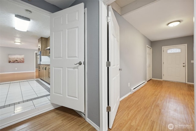 6836 Husky Way SE, Olympia, WA 98503 - entryway featuring a baseboard radiator and light wood-type flooring