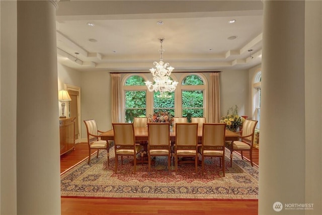 1055 91st Ave NE, Bellevue, WA 98004 - dining area with wood finished floors, a raised ceiling, and a chandelier