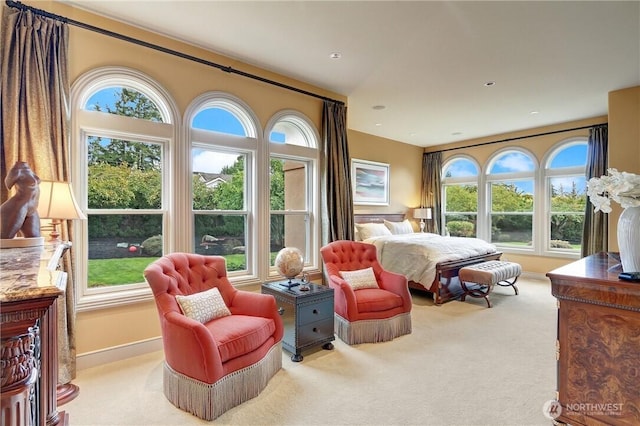 1055 91st Ave NE, Bellevue, WA 98004 - carpeted bedroom featuring multiple windows and baseboards