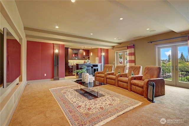 1055 91st Ave NE, Bellevue, WA 98004 - living room featuring light colored carpet, french doors, recessed lighting, and bar area