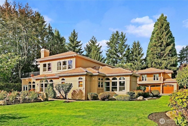 1055 91st Ave NE, Bellevue, WA 98004 - rear view of property featuring a chimney, stucco siding, and a tile roof