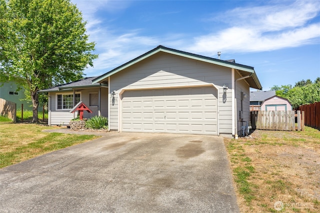 2376 Nicholas Dr, Ferndale, WA 98248 - ranch-style house featuring a garage and driveway