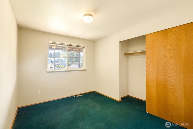 2376 Nicholas Dr, Ferndale, WA 98248 - unfurnished bedroom with dark carpet and a closet