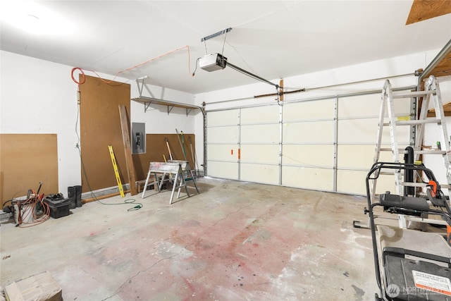 2376 Nicholas Dr, Ferndale, WA 98248 - garage featuring electric panel and a garage door opener