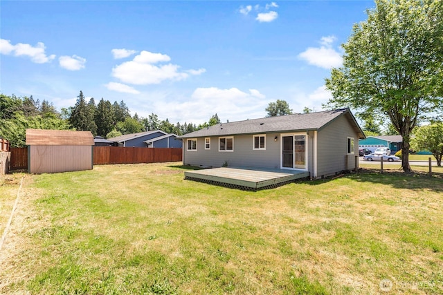2376 Nicholas Dr, Ferndale, WA 98248 - rear view of house featuring a fenced backyard, a shed, and a deck