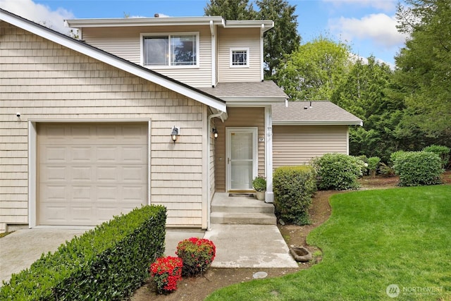 2419 S Meridian Unit C17, Puyallup, WA 98373 - view of front of property with a front yard, roof with shingles, and driveway