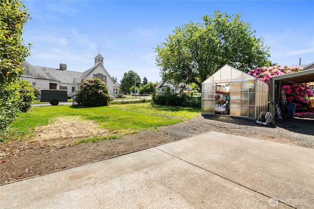 414 S Main, Mccleary, WA 98557 - view of grassy yard featuring an exterior structure, an outbuilding, and a patio