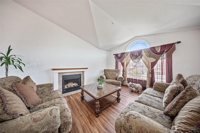 2427 Bellanca Ct, East Wenatchee, WA 98802 - living room with lofted ceiling, wood finished floors, and a fireplace