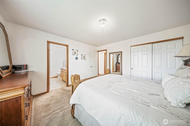 2427 Bellanca Ct, East Wenatchee, WA 98802 - bedroom featuring light colored carpet, a closet, and connected bathroom