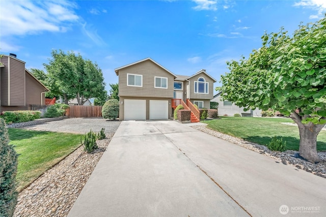 2427 Bellanca Ct, East Wenatchee, WA 98802 - bi-level home with an attached garage and driveway