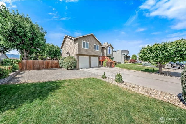 2427 Bellanca Ct, East Wenatchee, WA 98802 - view of home's exterior featuring driveway and an attached garage