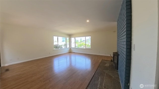 30022 2nd Pl SW, Federal Way, WA 98032 - unfurnished living room featuring wood finished floors and recessed lighting