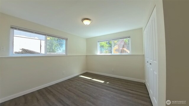 30022 2nd Pl SW, Federal Way, WA 98032 - unfurnished bedroom featuring dark wood finished floors and a closet