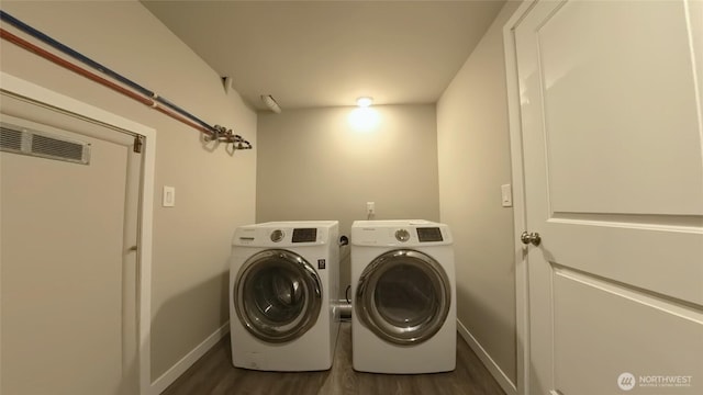 30022 2nd Pl SW, Federal Way, WA 98032 - laundry room featuring dark wood-type flooring and washing machine and dryer