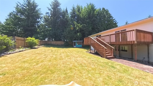 30022 2nd Pl SW, Federal Way, WA 98032 - fenced backyard with a wooden deck and stairs