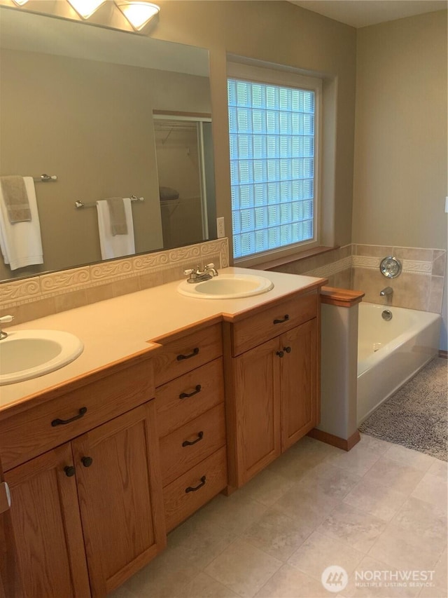 3328 Pennsylvania, Longview, WA 98632 - full bathroom featuring double vanity, a bath, and an enclosed shower